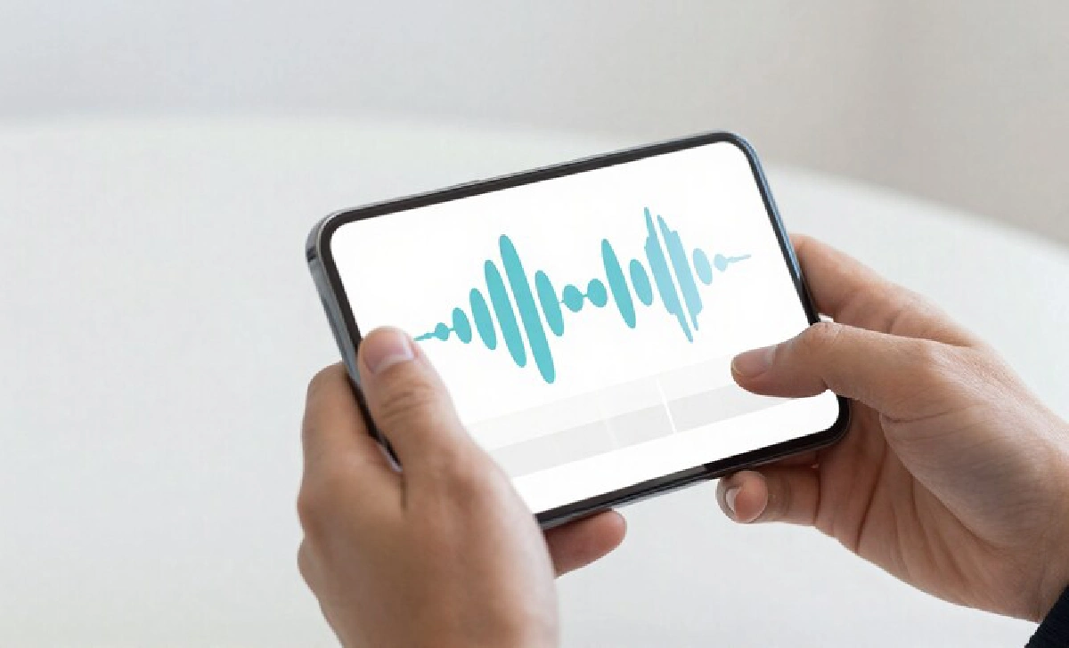 Person using AI voice assistant on smartphone